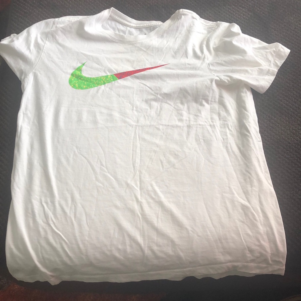 White Nike t shirt wit  red and green check on it